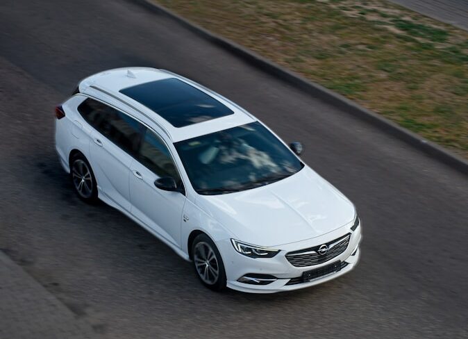 a white car parked on a road